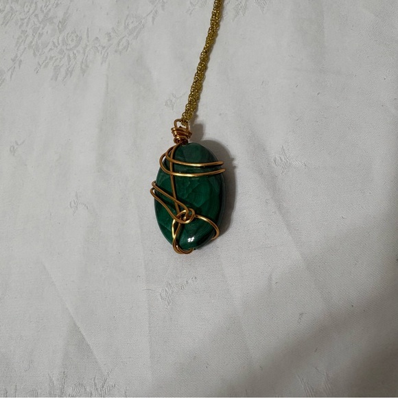 malachite wire-wrapped pendant with a gold-toned chain. - Picture 2 of 6